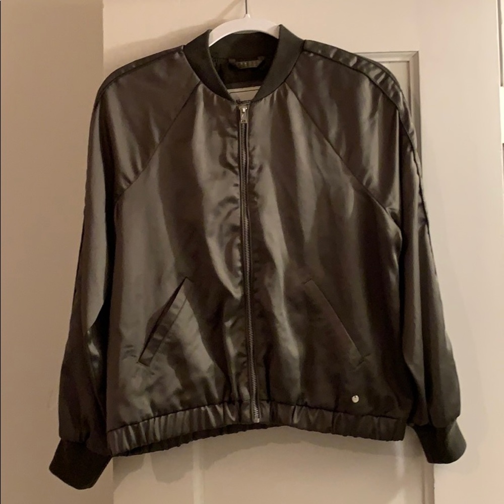 Green bomber jacket.